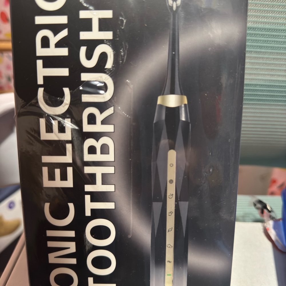 Black and Gold Sonic Electric Toothbrush